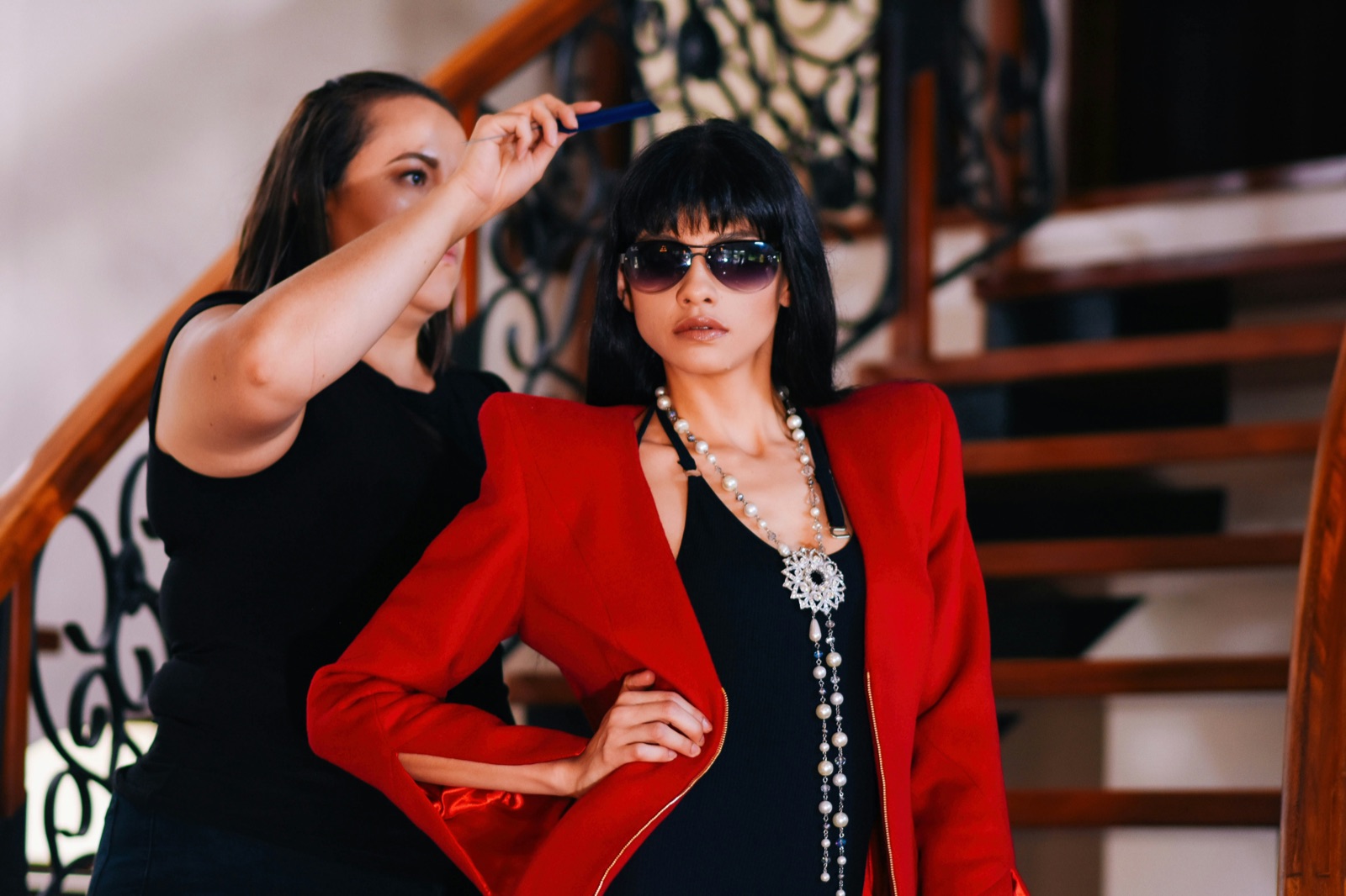 A model in a red blazer